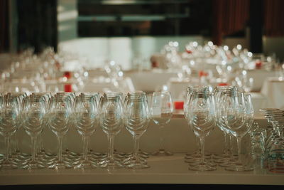 Glass of wine bottles on table