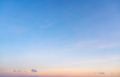 Low angle view of cloudy sky at sunset