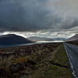 Scenic view of field against sky at night