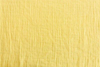 Full frame shot of yellow wooden surface