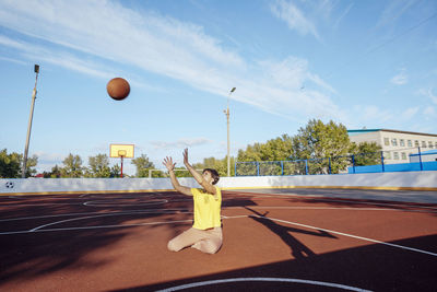 Passion and poise,  student girl shines bright on the red rubber basketball court