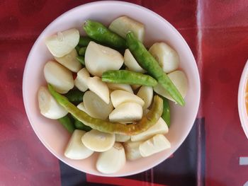 High angle view of chopped vegetables in bowl on table