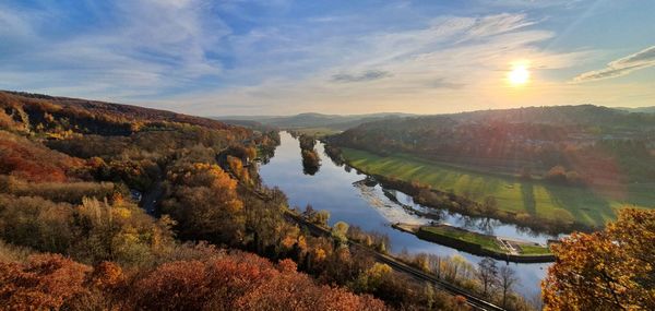 Scenic view of lake against sky during autumn