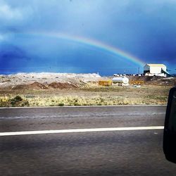 View of road against cloudy sky