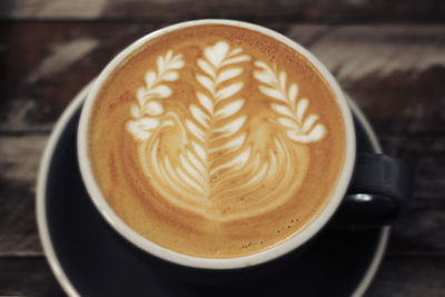 High angle view of cappuccino on table