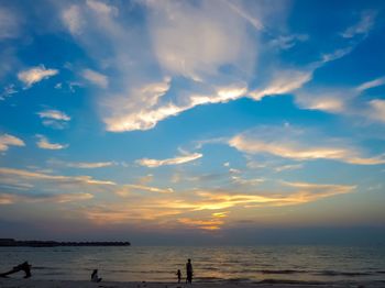 Scenic view of sea at sunset