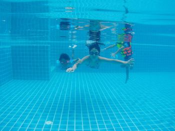 People swimming in pool