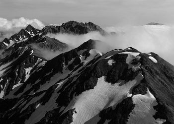 Low angle view of mountains against sky