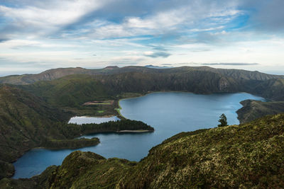 Lagoa do fogo lagoon surrounded by green forest located on sao miguel, azores, portugal.