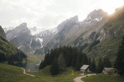 Scenic view of landscape and mountains against sky