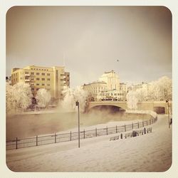 View of river with buildings in background