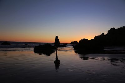 Scenic view of sea at sunset