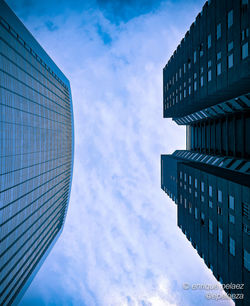 Low angle view of building against blue sky