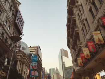 Low angle view of buildings against clear sky