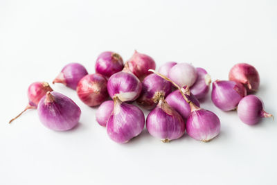 Close-up of blueberries against white background