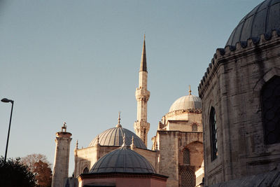 Low angle view of buildings against clear sky