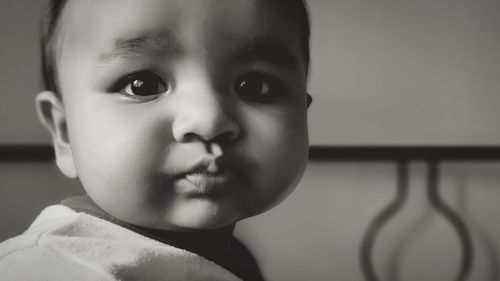 Portrait of cute boy at home