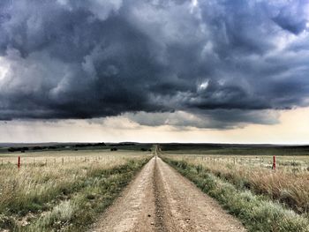 Storm clouds over field