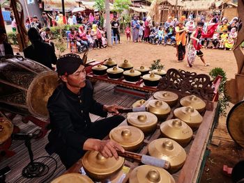 High angle view of people sitting at market