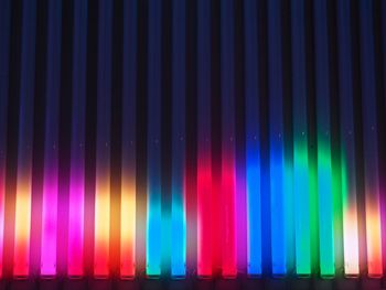 Full frame shot of multi colored lights against black background