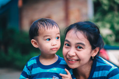 Portrait of smiling mother and son