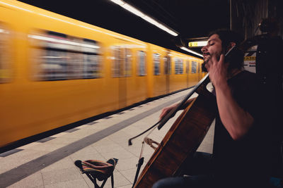 Street musician at railroad station