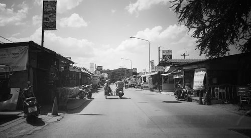 Street in city against sky