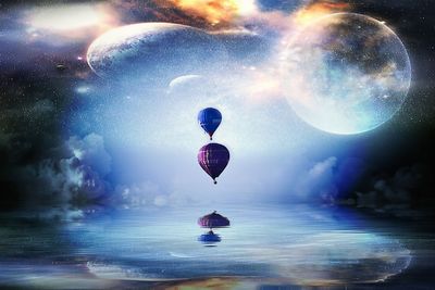 Digital composite image of hot air balloon against sky