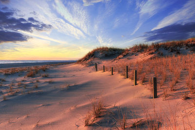 Scenic view of landscape against sky during winter