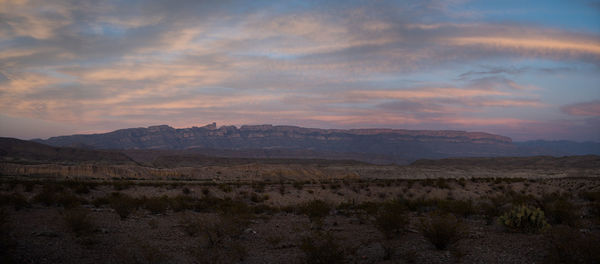 Scenic view of landscape against sky during sunset