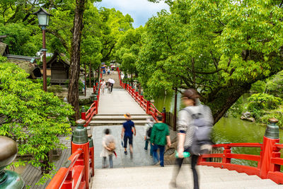 Red bridge path to dazaifu tenmangu temple in fukuoka, japan