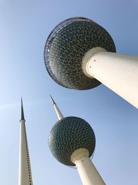 Low angle view of communications tower against sky