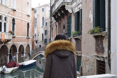 Rear view of woman in city