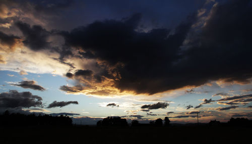 Low angle view of dramatic sky during sunset