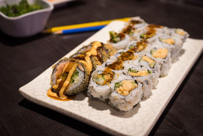 Close-up of sushi served on table