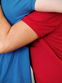 Midsection of couple embracing