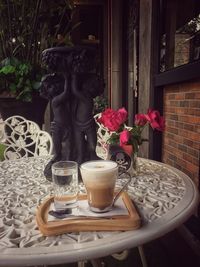 Flower vase on table