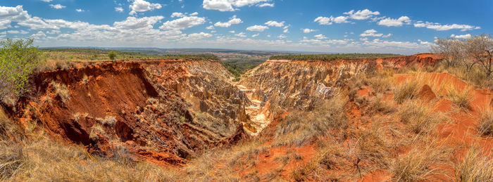 View of rock formation on landscape against sky