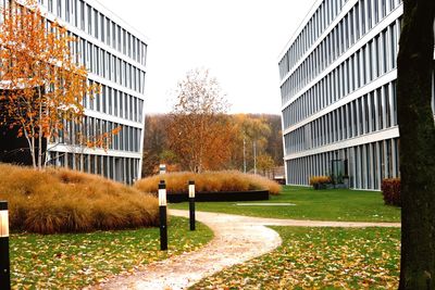 Modern buildings in city against sky
