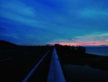 Scenic view of calm sea at sunset