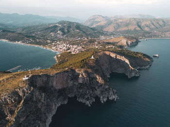 High angle view of rocks by sea