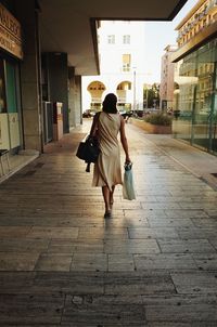 Woman walking on city street