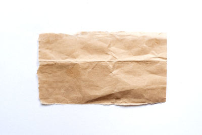 High angle view of paper against white background