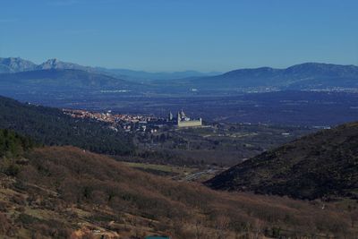 Scenic view of landscape and mountains against sky