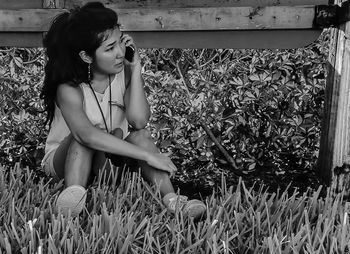 Girl sitting on grass