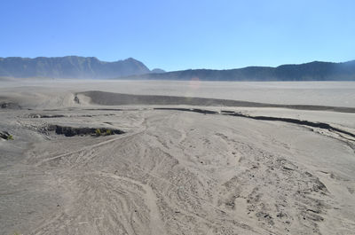 Scenic view of desert against clear sky