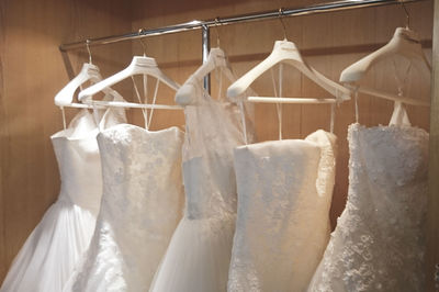 Close-up of clothes hanging on rack