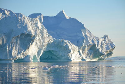 Scenic view of frozen lake against mountain