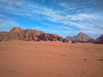 Scenic view of desert against sky