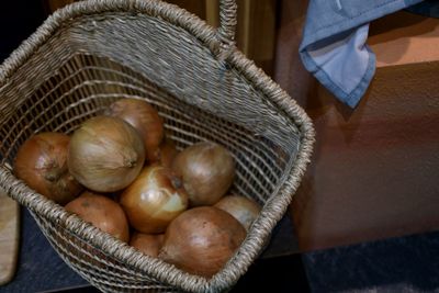 High angle view of vegetables in basket on table